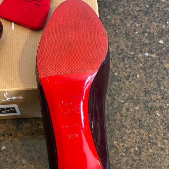 Wine colored Christian Louboutin gently used simple pump